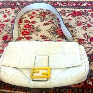 Fendi white cross body leather bag w gold hardware worn a few times